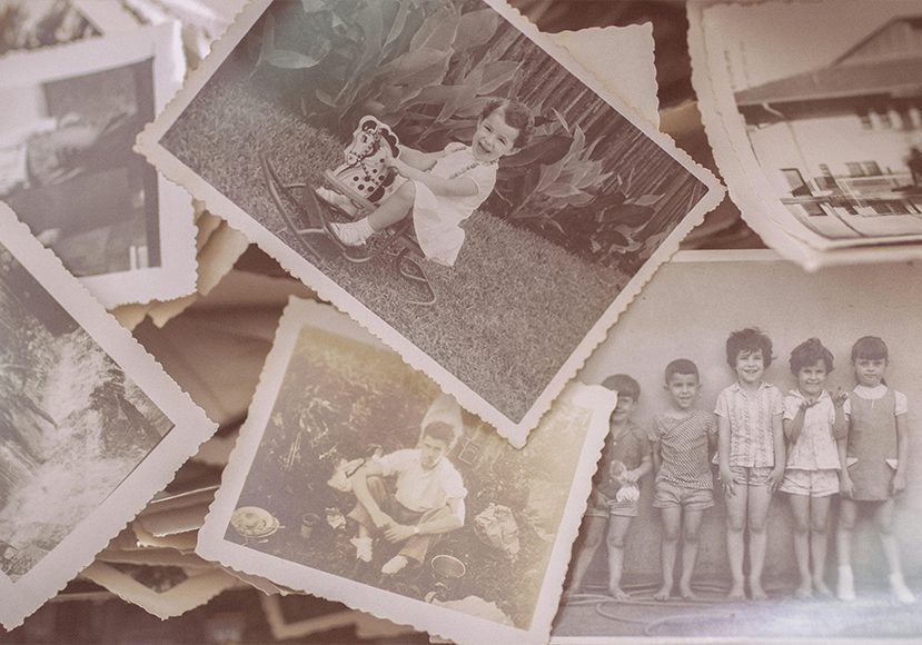 A collection of vintage black-and-white photographs showing children playing, posing, and outdoor scenes, scattered in a pile. A collection of vintage black-and-white photographs showing children playing, posing, and outdoor scenes, scattered in a pile.