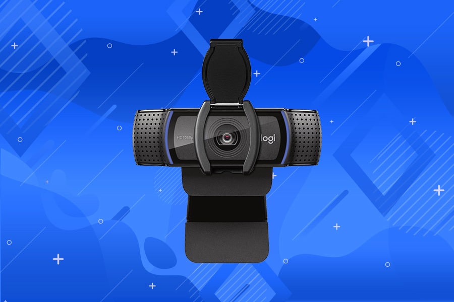 A black Logitech webcam on a blue patterned background.