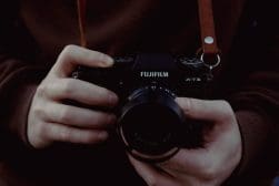A person holding a camera.