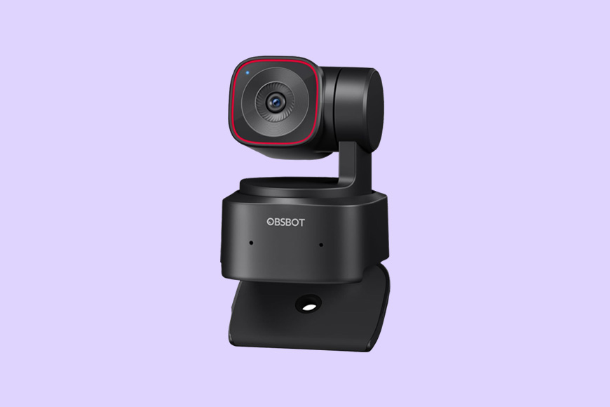 A black OBSCOT webcam on a purple background, featuring a lens with a red border and a flexible mount.