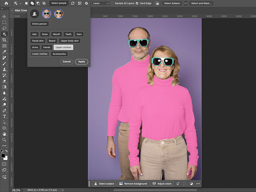 Two people wearing matching pink turtlenecks, beige pants, and white sunglasses stand in front of a purple backdrop; Photoshop selection tools are visible on the screen.